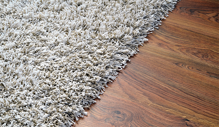 Carpet on wood floor
